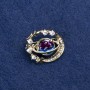 Planet Brooch in golden metal, enamel and crystals, 22×24 mm +